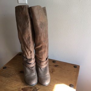Knee high strap boots